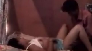 Couple enjoying sex in their bedroom